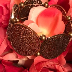 Stunning elastic gold/bronze color bracelet